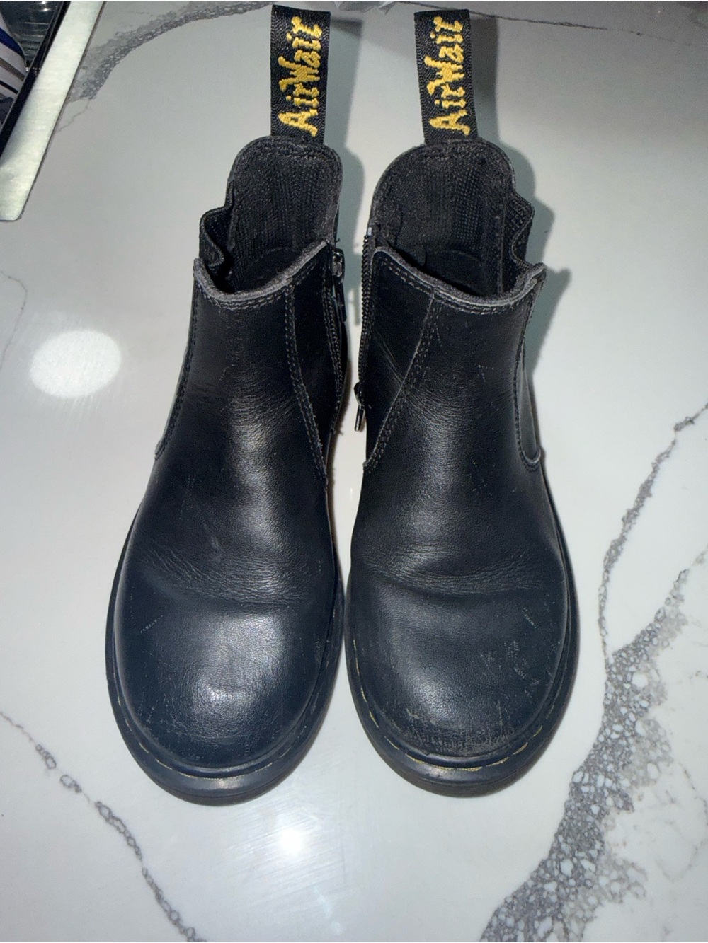 Dr. Martens Black Leather Ankle Zip Boots with Yellow Heel Loop